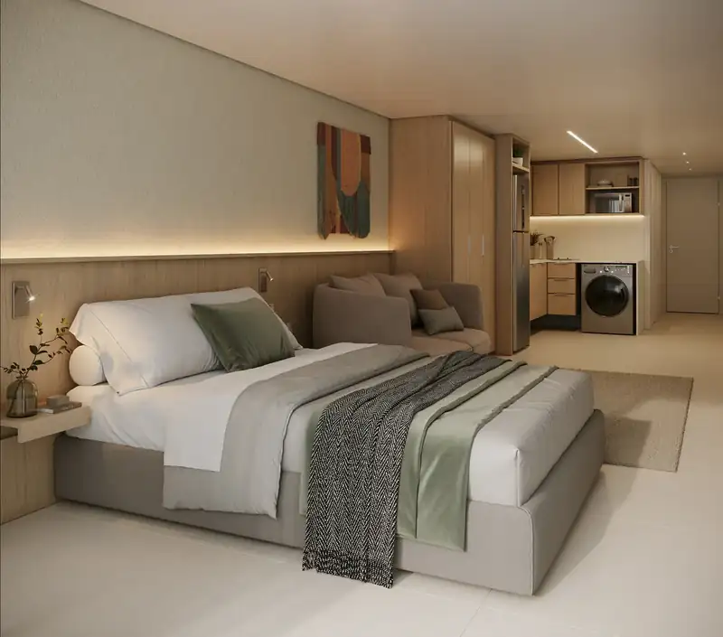 Studio interior with custom cabinetry and an open-plan kitchen